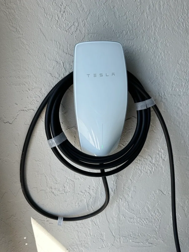 Others Electric crew running a 240V circuit for an EV charger