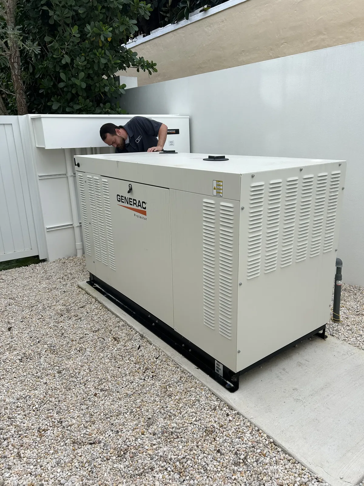 Others Electric technician completing a generator installation in Florida