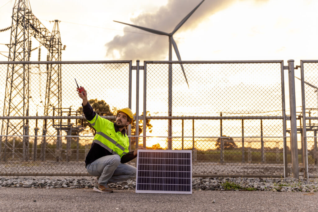 Professional Man Energy Engineer Holding the Solar Panel. Altern